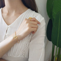 Pearl interlocking ring, ring, ring